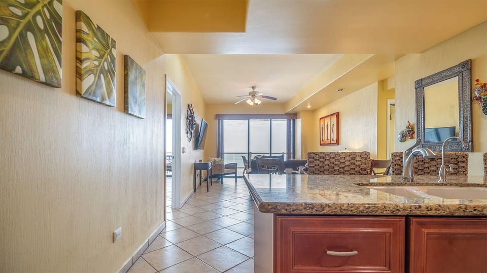 Enter the spacious condo.