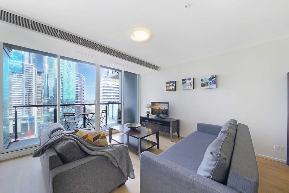 A spacious living with a 3-seater sofa bed that folds out to a double.