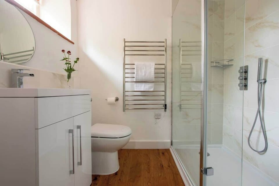 Second bathroom (downstairs) with walk in shower