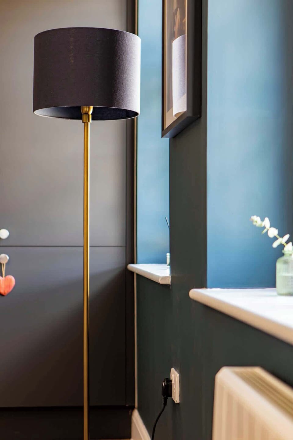 Bathroom with towel rail and rain shower