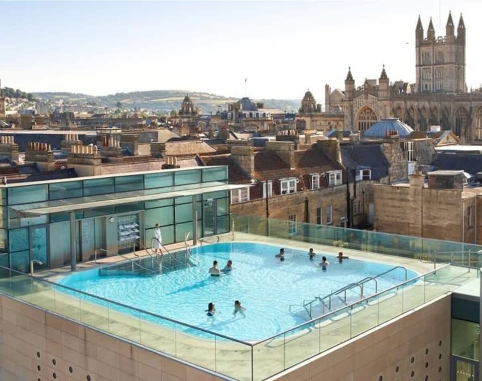 Take a dip at the stunning rooftop thermal bath at the Thermae