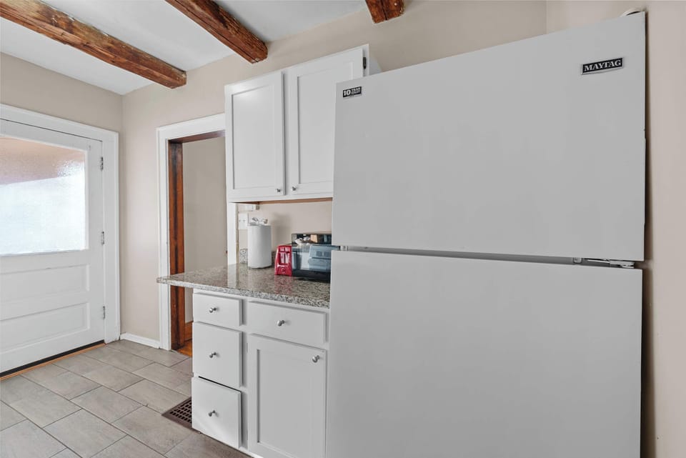 The airy kitchen in Tibet Twins 1 offers ample space & every home comfort