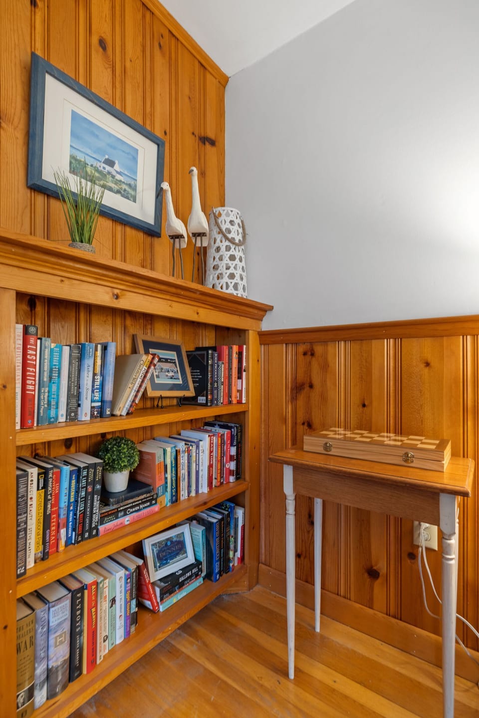 Escape into a story with our cozy bookshelf corner, filled with everything from thrillers to travel guides.