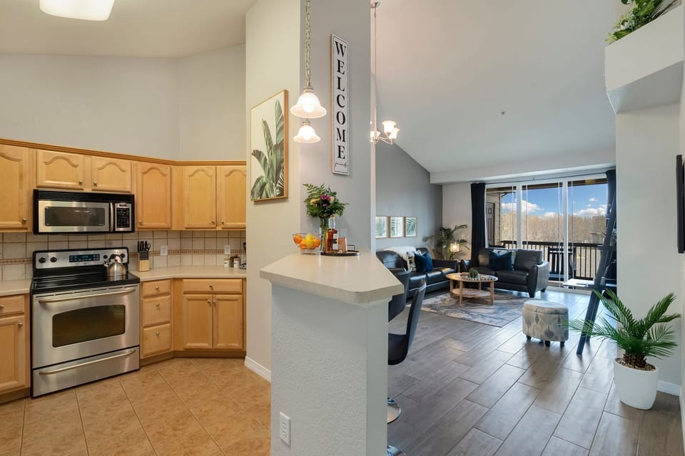 Kitchen and Dining Area with Vaulted Ceilings