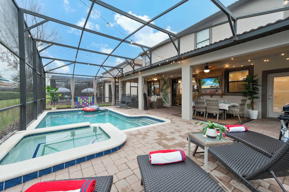  For some fun in the water you can enjoy a game of  life sized Connect 4. Outdoor dining table, TV, loungers and couches. Pool & Spa heat available for an an additional $50 per night