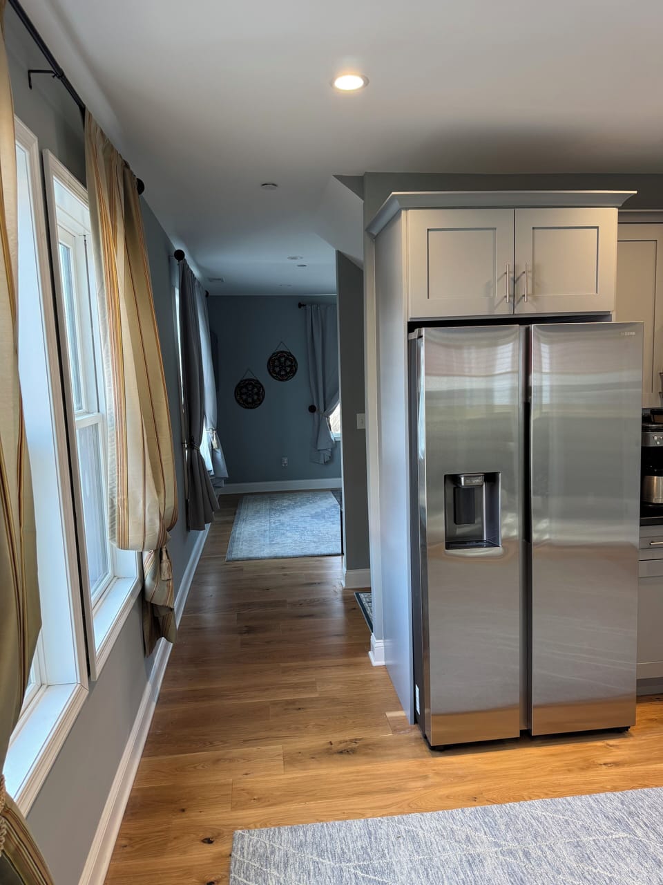 Kitchen with entrance to living room