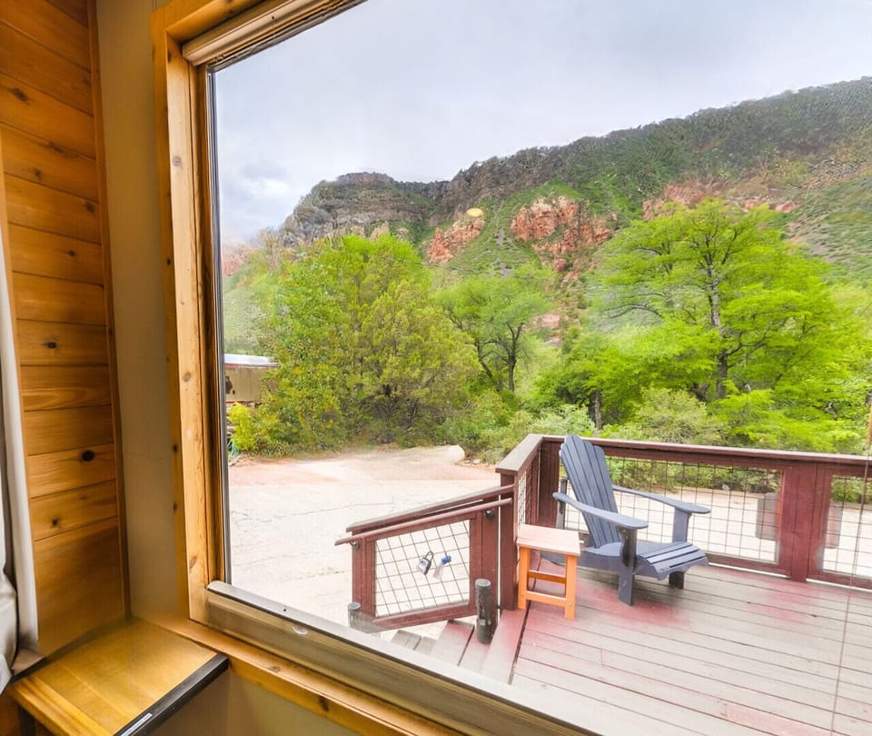 Canyon and deck views framed right through the window.