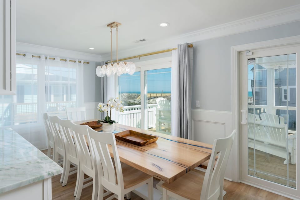 Custom natural oak table with resin and gorgeous ocean views