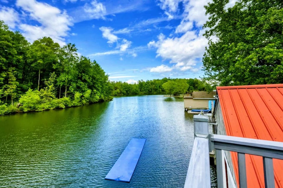 Start your day with breathtaking views of Lake Anna from the deck, featuring a floating mat for endless waterfront fun.