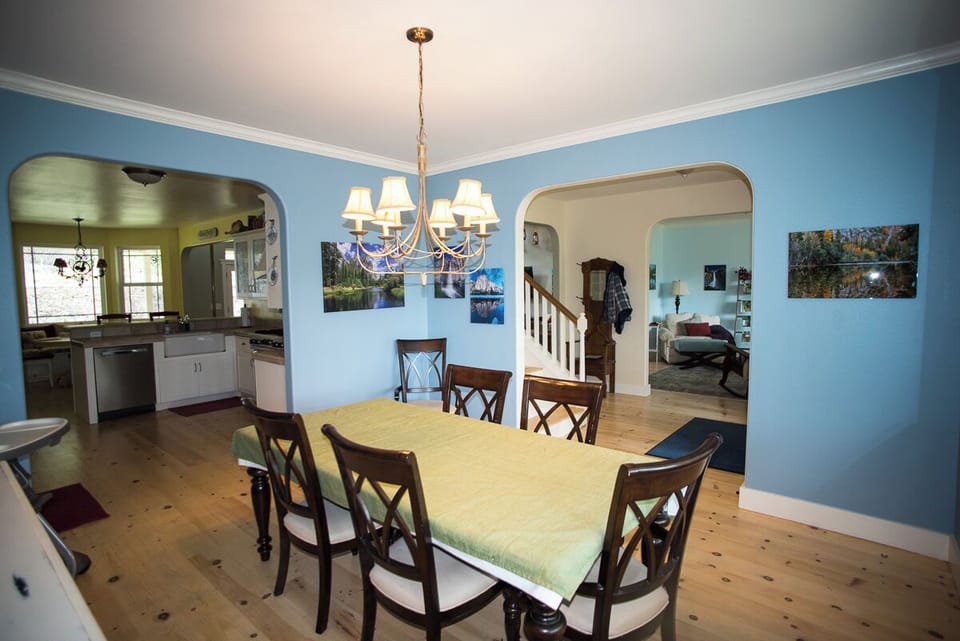 Dining room with a view of the kitchen and reading room