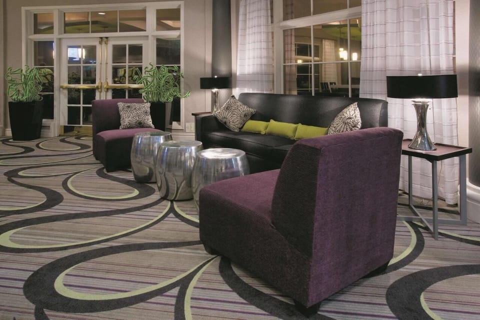 Unwind on plush seating in a calm, modern lounge.