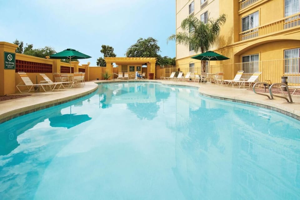 Soak up warm afternoons with plenty of poolside seating.