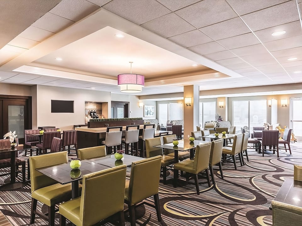 Gather comfortably in the airy lounge with plenty of seating.