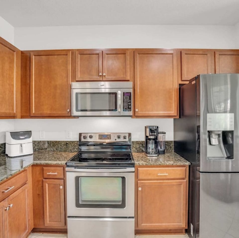 Stainless steel appliances, coffee maker and air fryer.