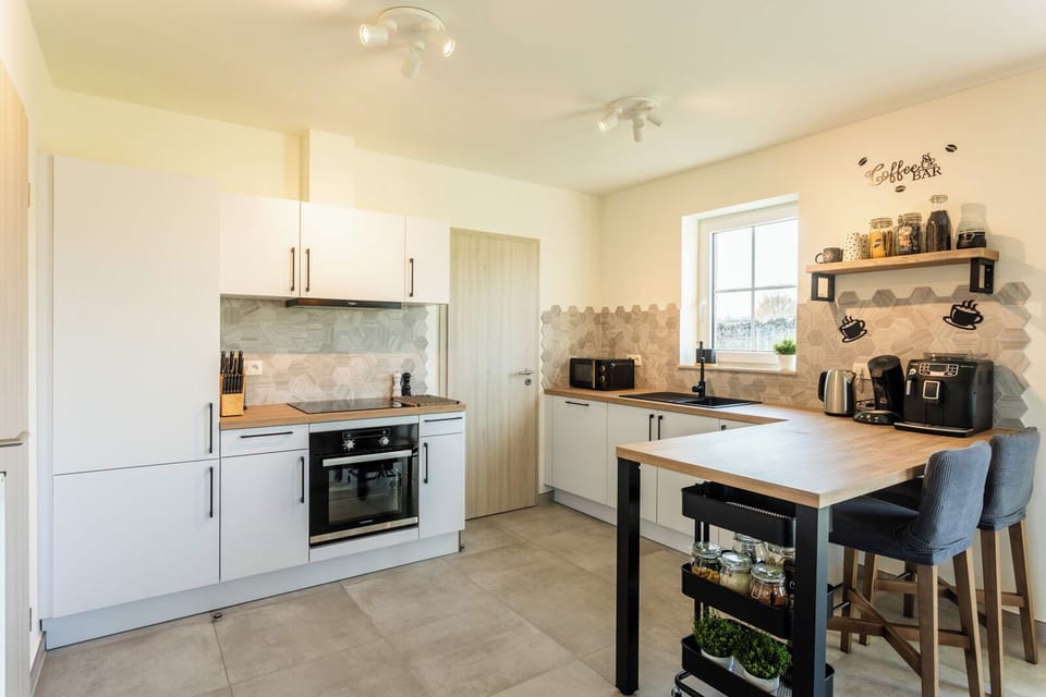 Large kitchen with oven, micro, stove and dishwasher