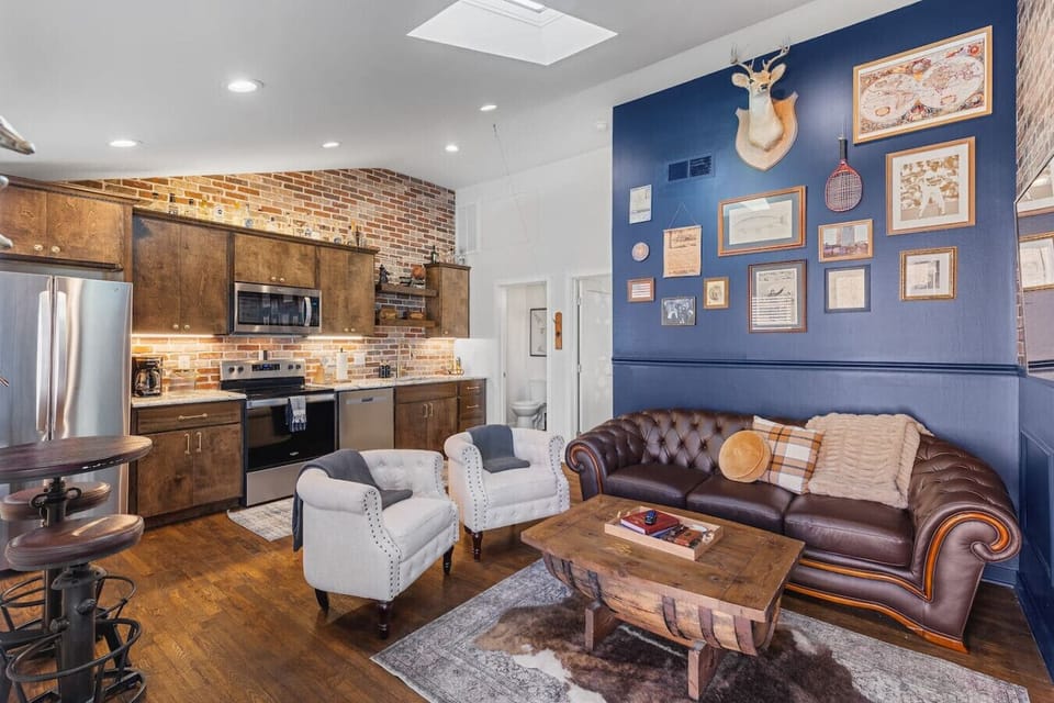 Western style living room with lots of natural light! Smart TV with all the apps you could want. The couch turns into a pullout sofa. Rustic and unique decor throughout the entire condo!