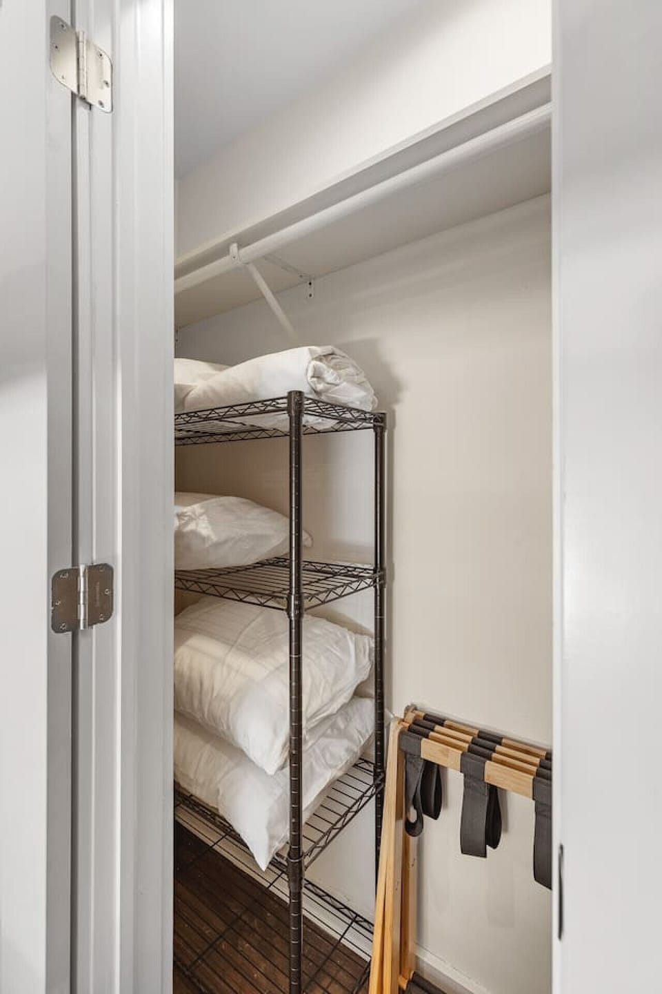 Two twin bunkbeds in the Bedroom. Full length mirror, Closet with hangers and shelf, Nightstands to store your items in.