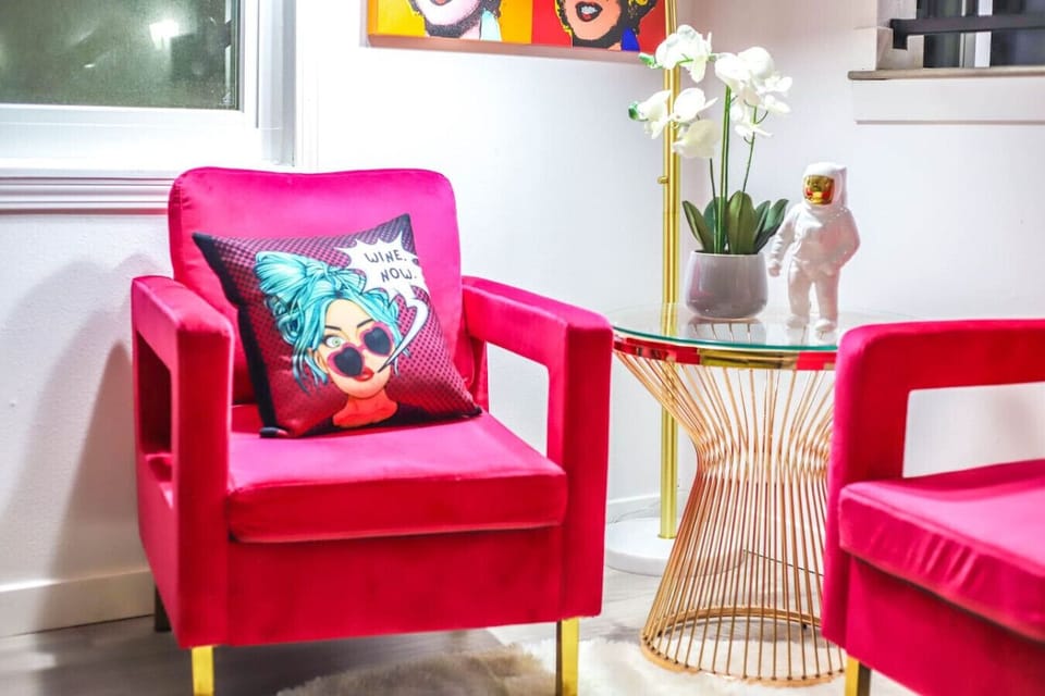 Pop Art Inspired Living Room with Smart TV and Plenty of Seating