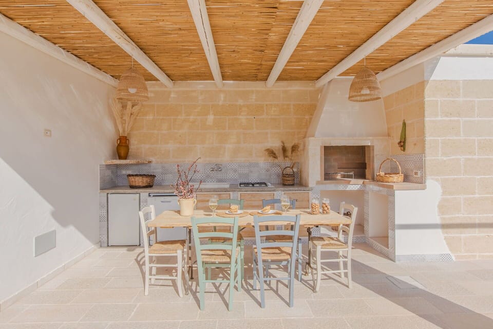 Flooring, Furniture, Floor, Chair, Tile, Natural Material, Design, Shade, Outdoor Furniture, Kitchen & Dining Room Table