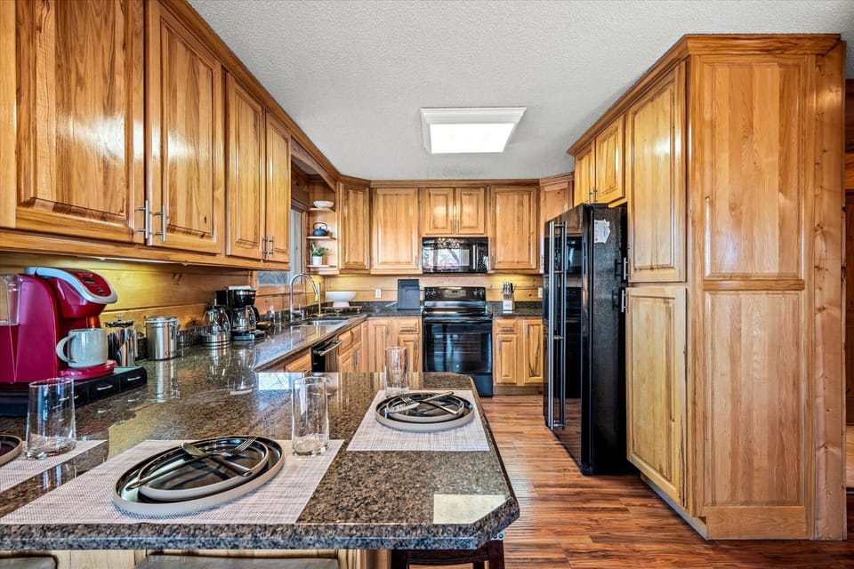 Start your day with a fresh brew and a mountain view from this charming kitchen nook.