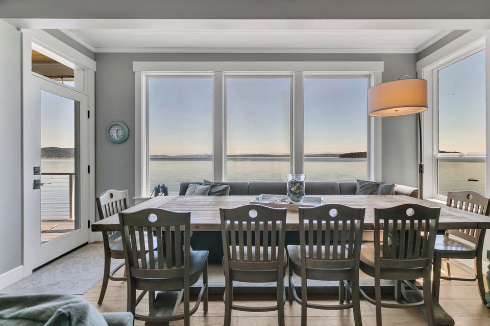 Waterfront dining with panoramic views and seating for six