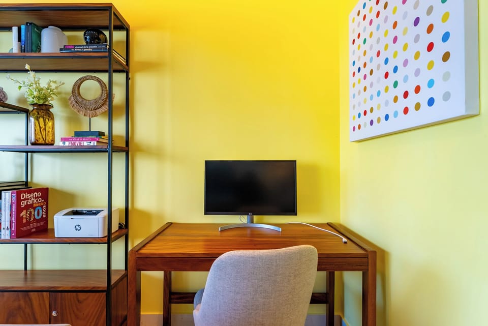 work space with printer sand monitor 