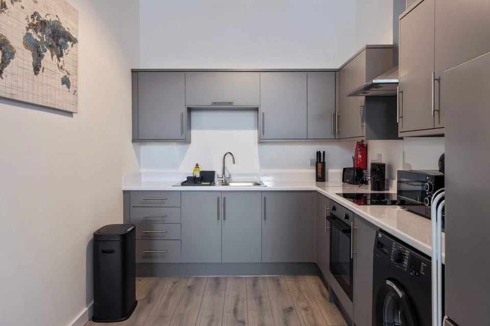Well equipped Kitchen with washing machine, oven, hob, microwave, fridge, kettle, toaster, coffee maker and utensils