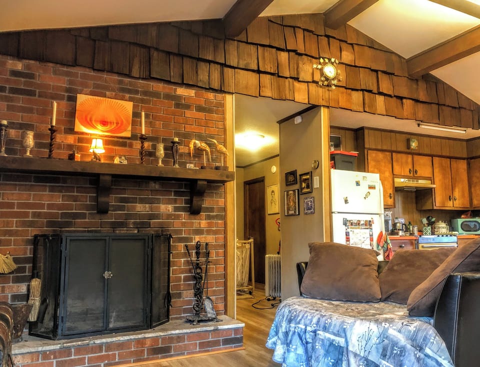 Open floor plan in the main area, with a hallway leading toward the bedrooms.