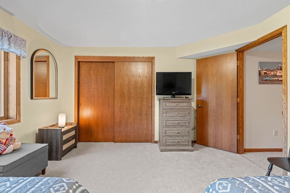 Bedroom 2 located on lower level