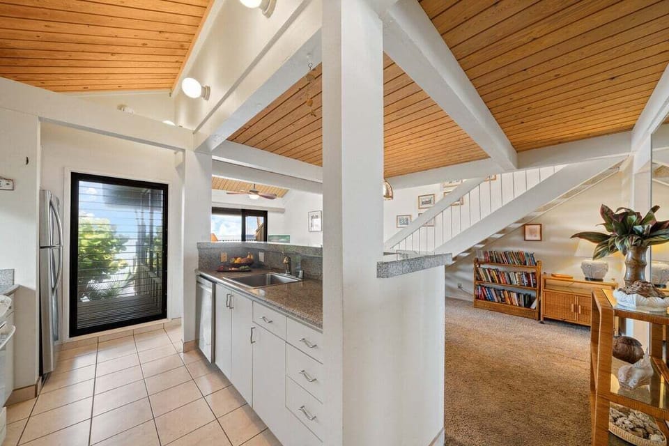 Kitchen and living room filled with great natural light throughout the day creating a bright and welcoming open space.