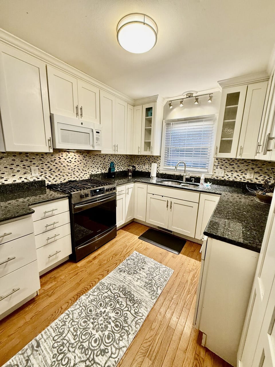 Large kitchen that is perfect for gathering and/or cooking a large meal.