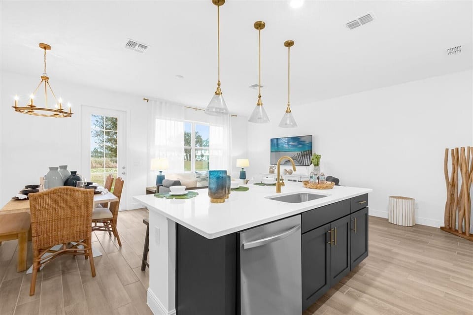 Spacious kitchen with island seating, perfect for family meals or morning coffee.