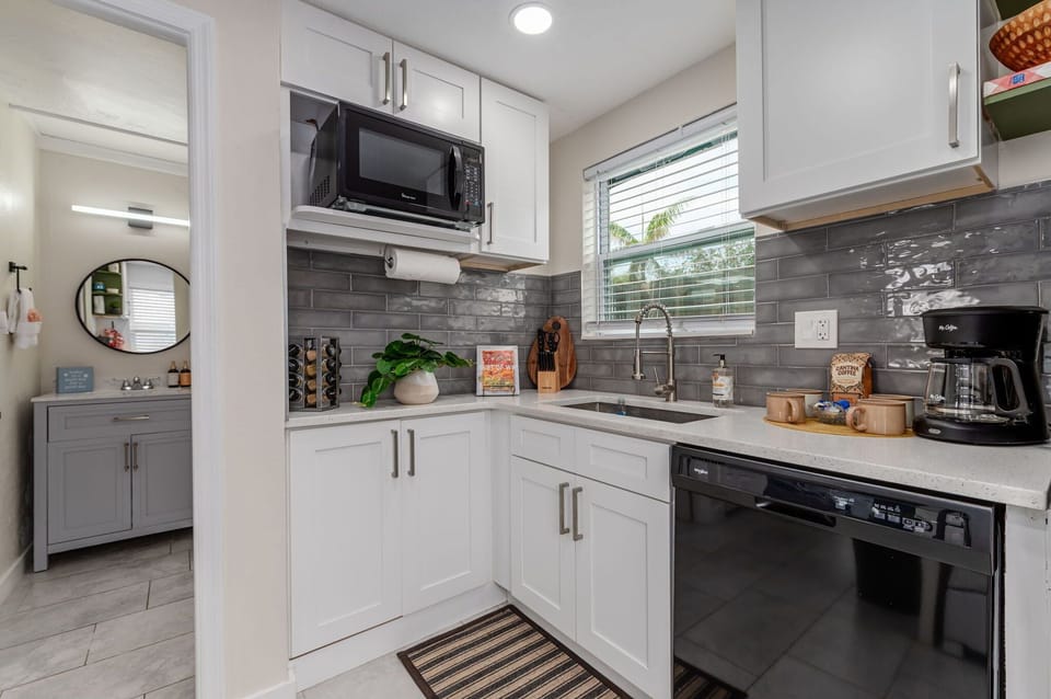 The kitchen is fully equipped with everything you need for a comfortable stay, whether you're visiting for a few nights or an extended stay.