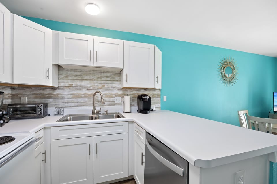 Beach Vibe Condo at Grand Caribbean East - Love this backsplash!