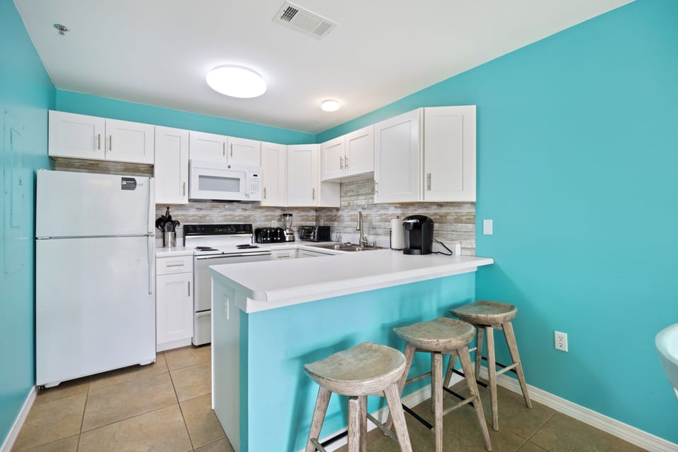 Beach Vibe Condo at Grand Caribbean East - Light and bright!