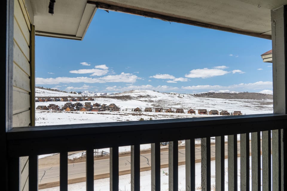 Stunning winter mountain views stretch across snow-covered peaks from your private balcony, creating a peaceful retreat at Summit Unit 1303.