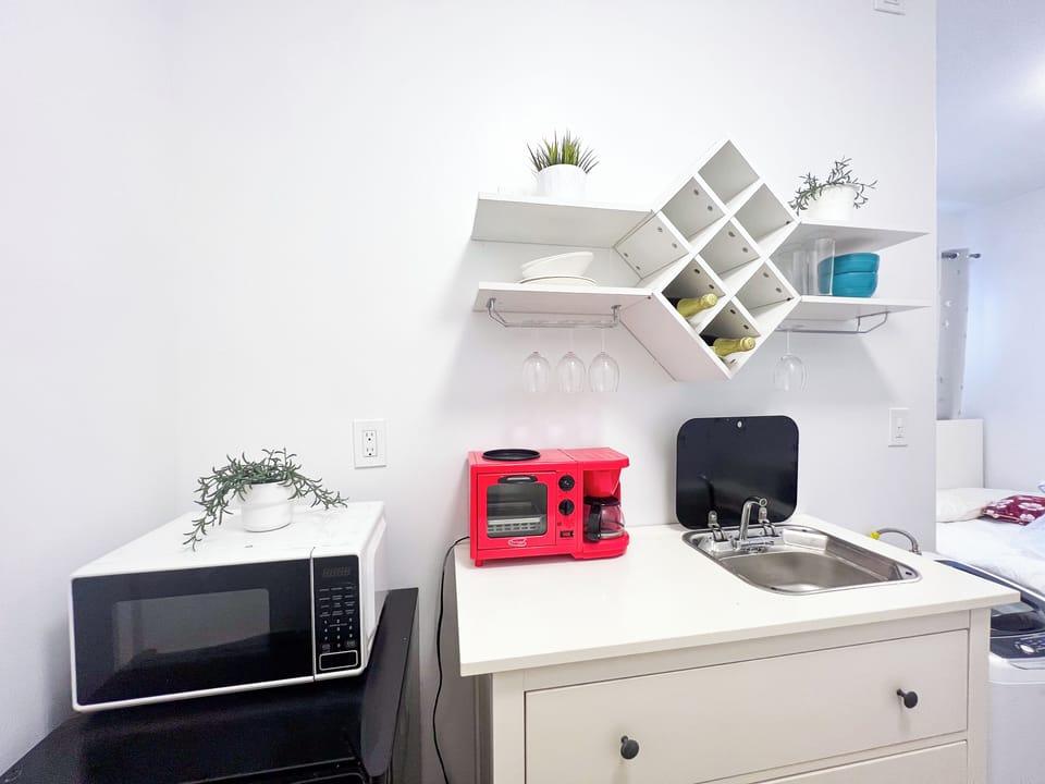 Kitchenette with Coffee Maker, Toaster Oven and Microwave