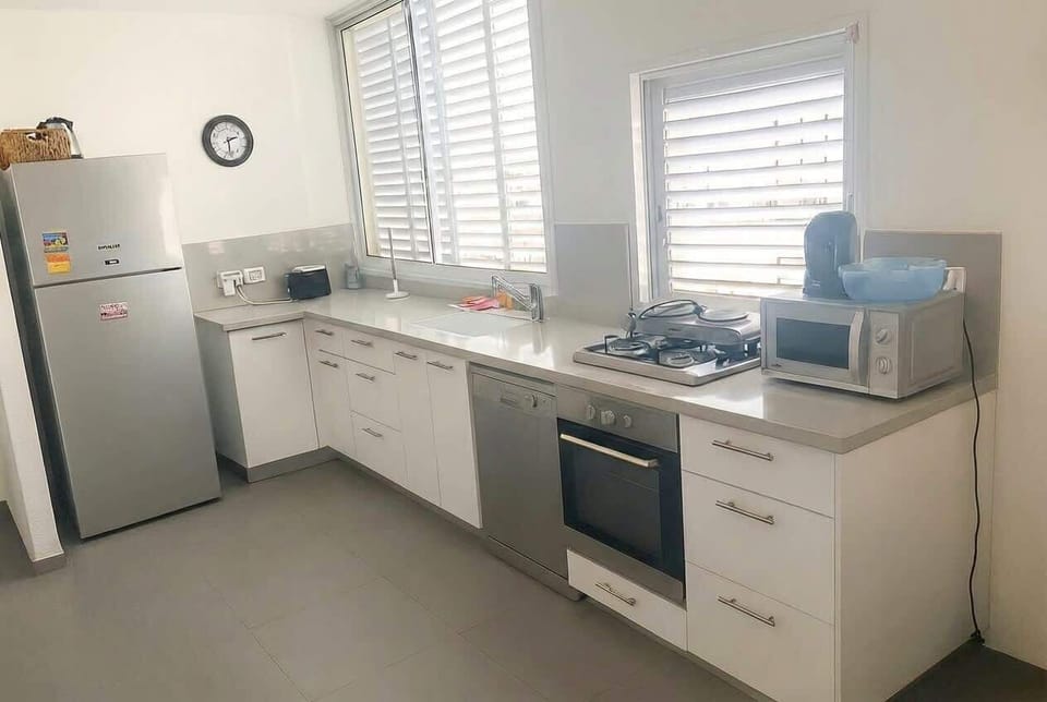 Practical kitchen designed for convenient everyday cooking, matching photos exactly and supporting comfortable longer stays effortlessly.