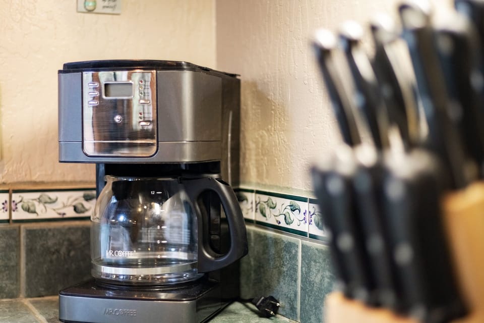 Kitchen with drip coffee maker, dishwasher, microwave and more