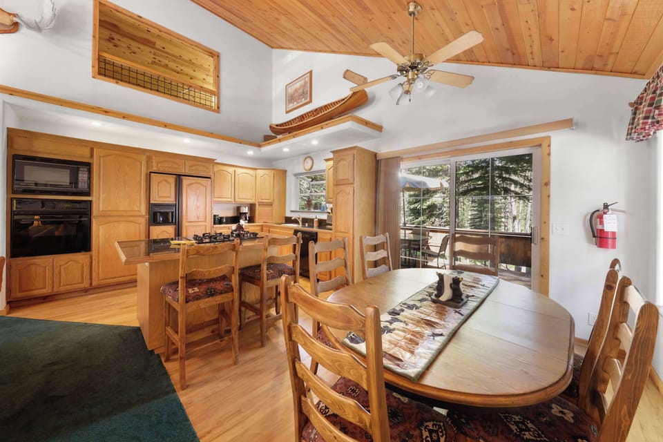 Dining table with seating for 6 and Kitchen bar counter with seating for 2