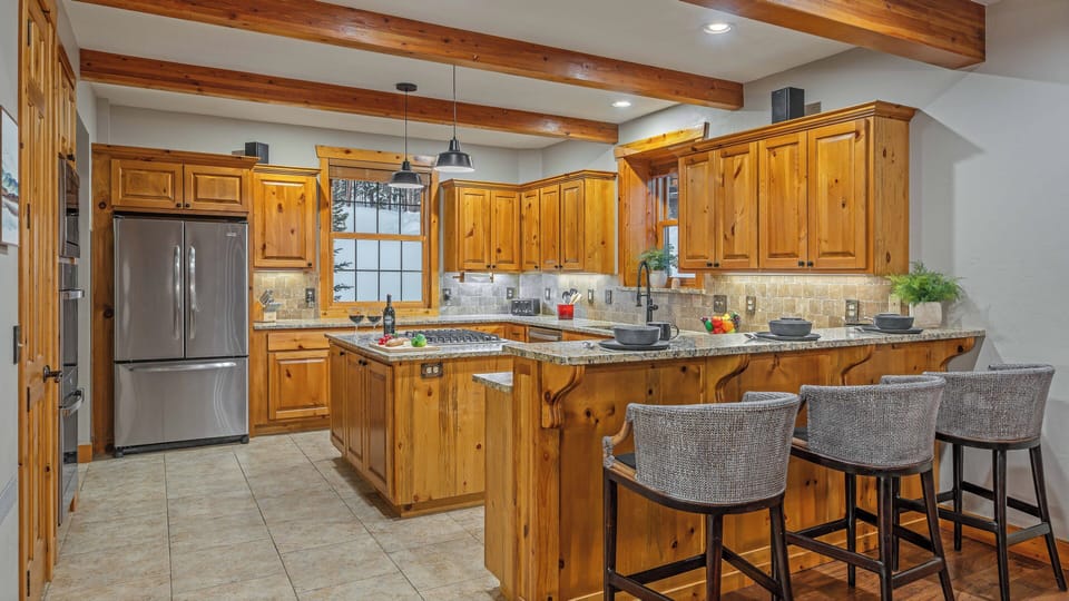Gourmet kitchen with breakfast bar seating