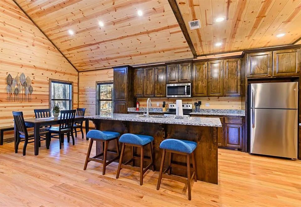 The heart of the home, this bright and spacious kitchen flows seamlessly into the dining and living areas, creating the perfect gathering space.