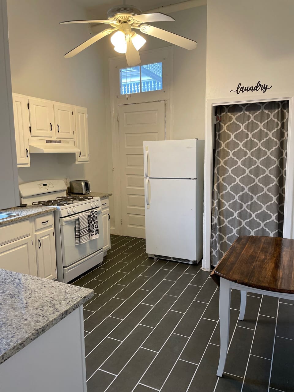 Kitchen with laundry area