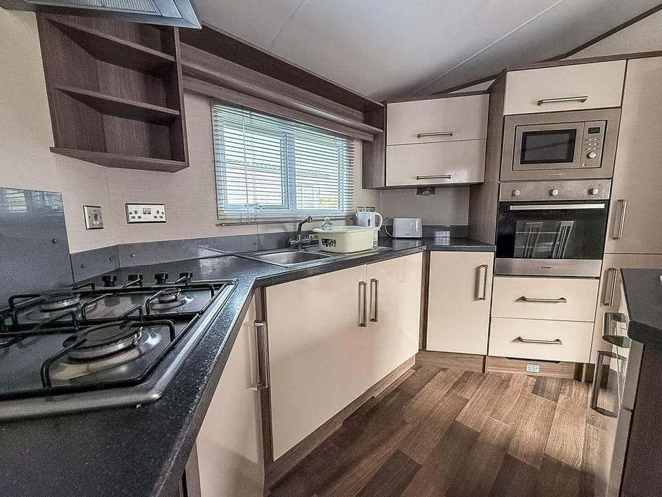 Modern kitchen with sleek appliances and ample counter space
