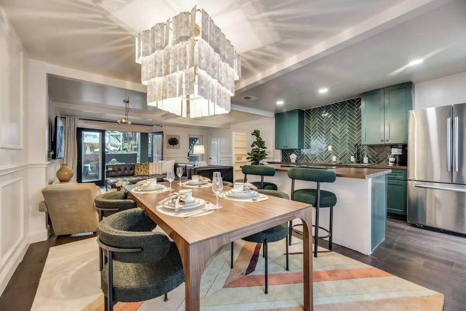 The dining table that’s perfect for both meals and work, complemented by a beautiful chandelier to add a touch of light and elegance when needed.