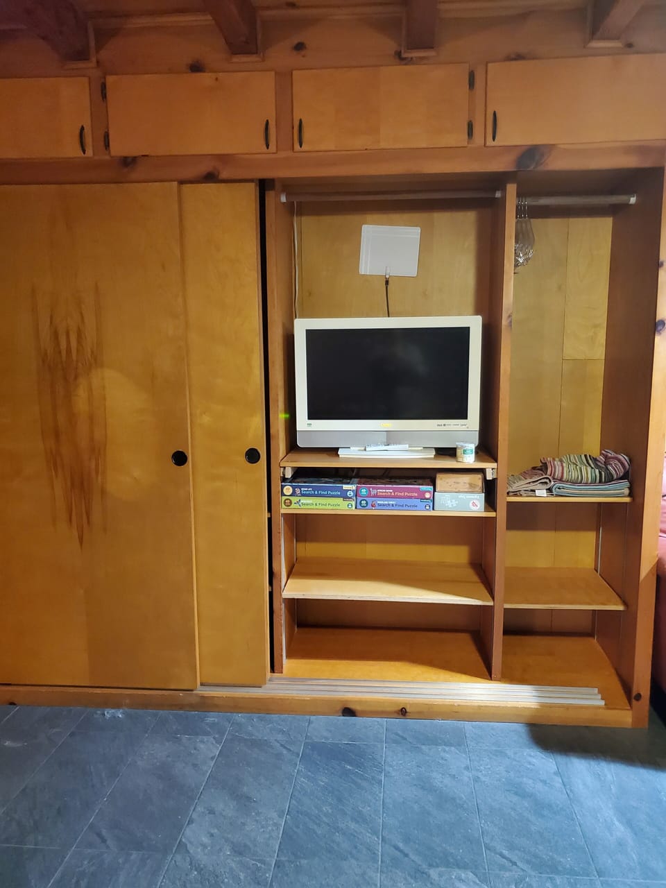 TV slides out and turns for flexible viewing