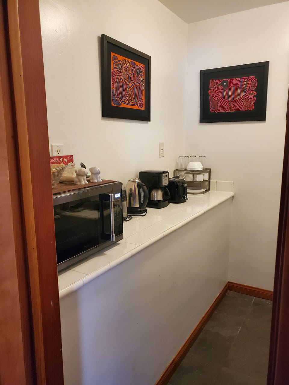 Kitchenette - microwave, toaster, coffee grinder, coffee-maker, and kettle