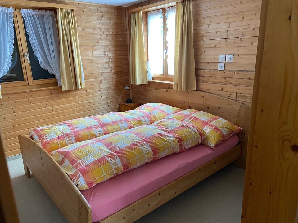 Bedroom with a double bed and a single bed