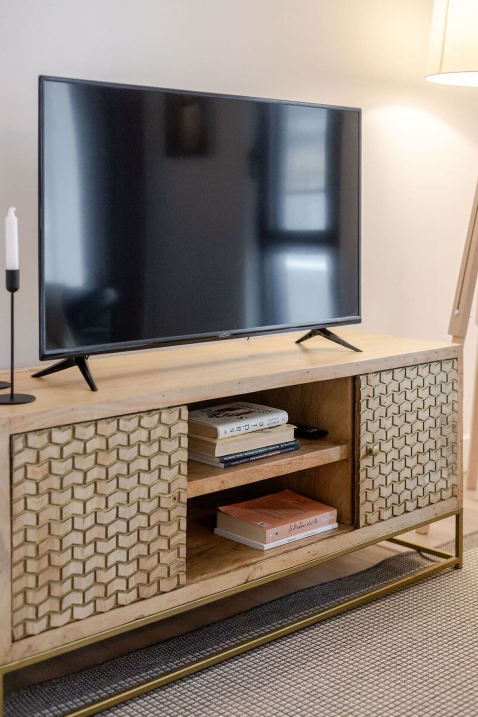 Smart TV and designer console for relaxing nights in.