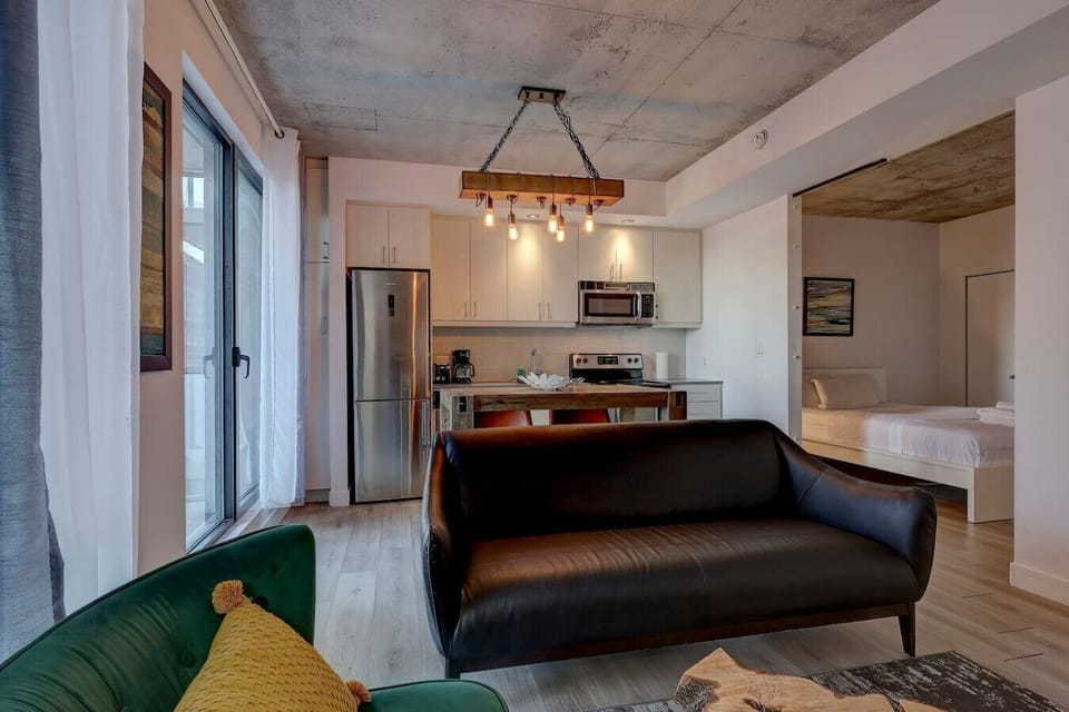 A seamlessly connected space where the modern dining area meets the relaxing lounge, offering both style and comfort.